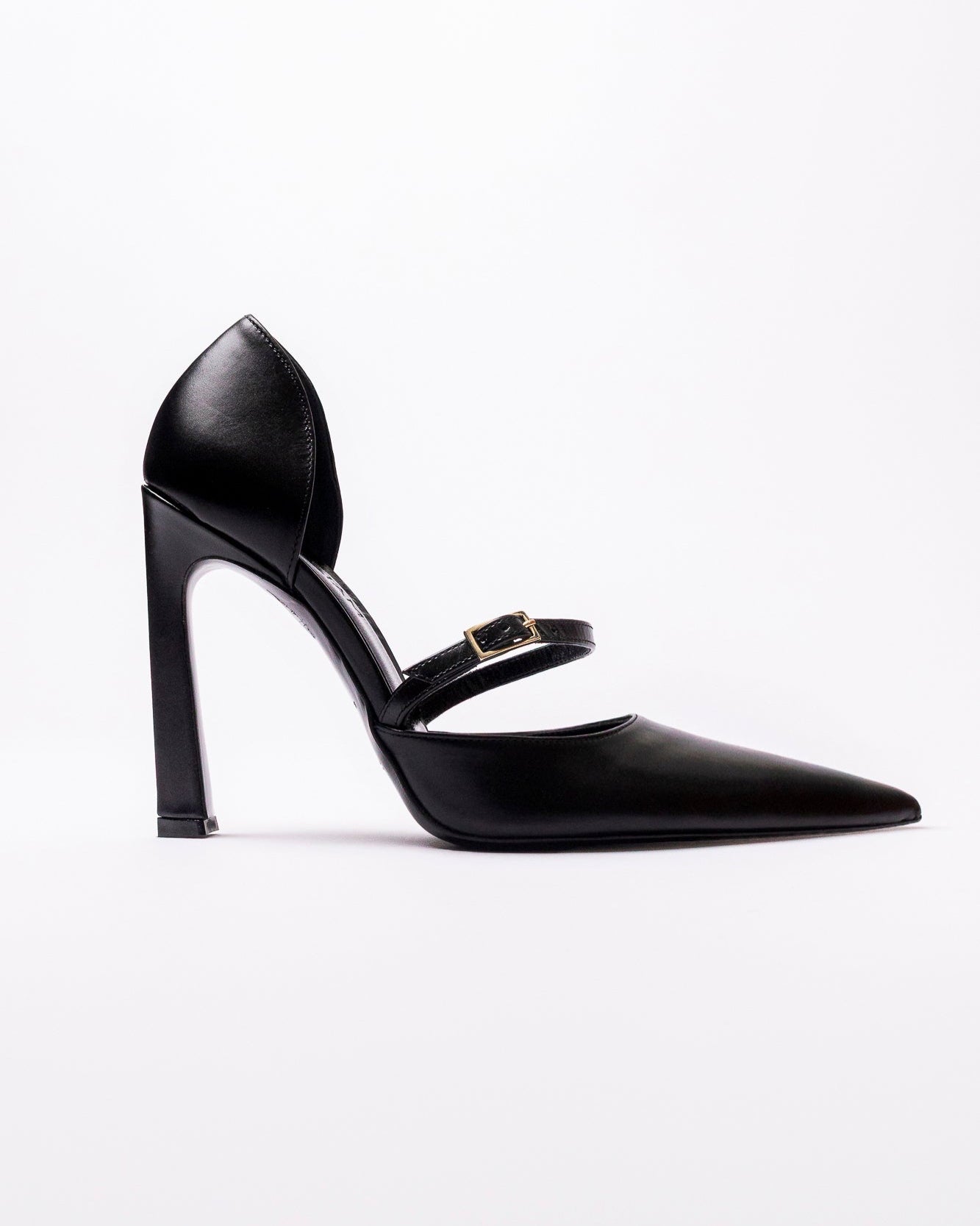 Black high-heeled shoe with a strap on a white background