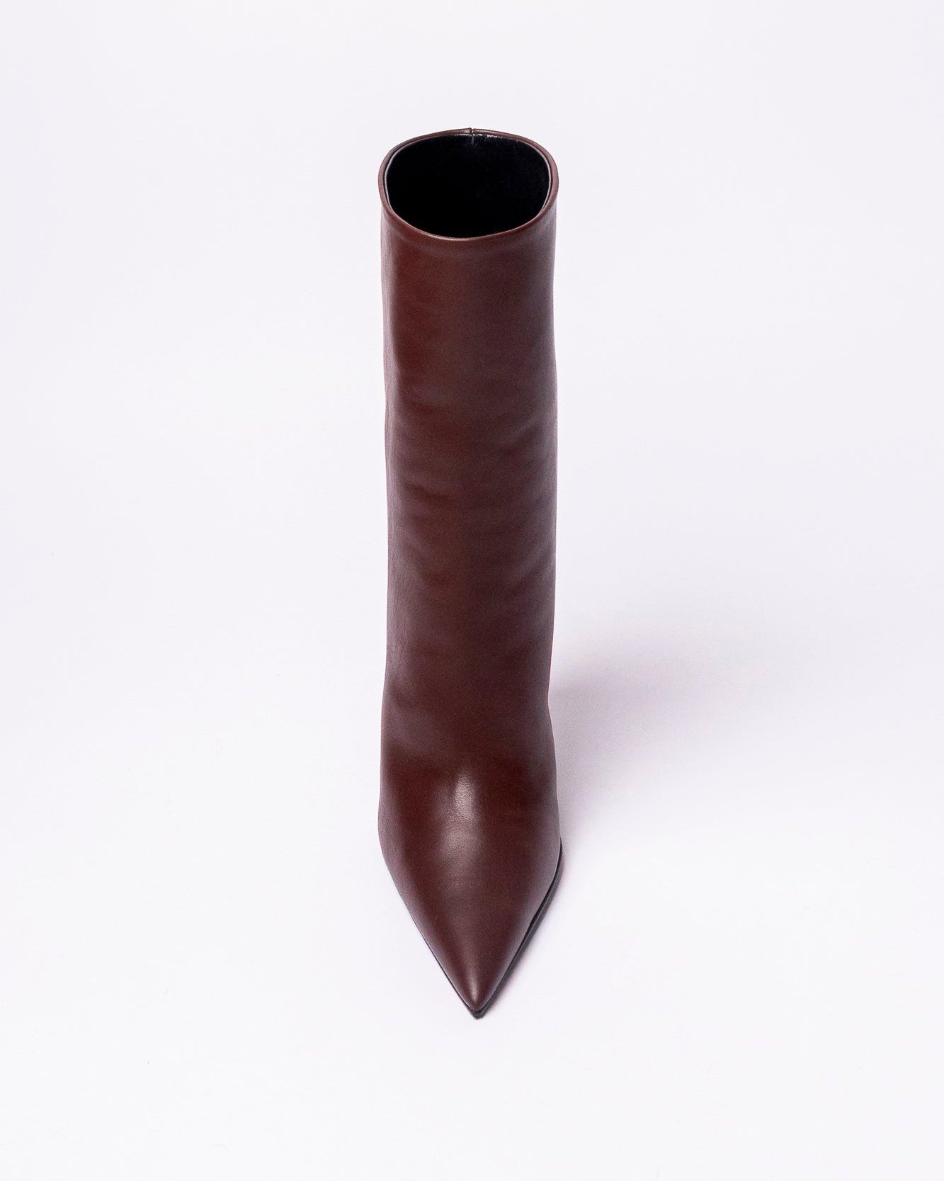 Brown knee-high boot on a white background