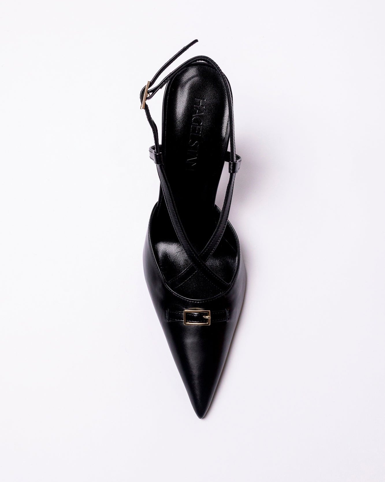 Black high-heeled shoe with a slingback design on a white background
