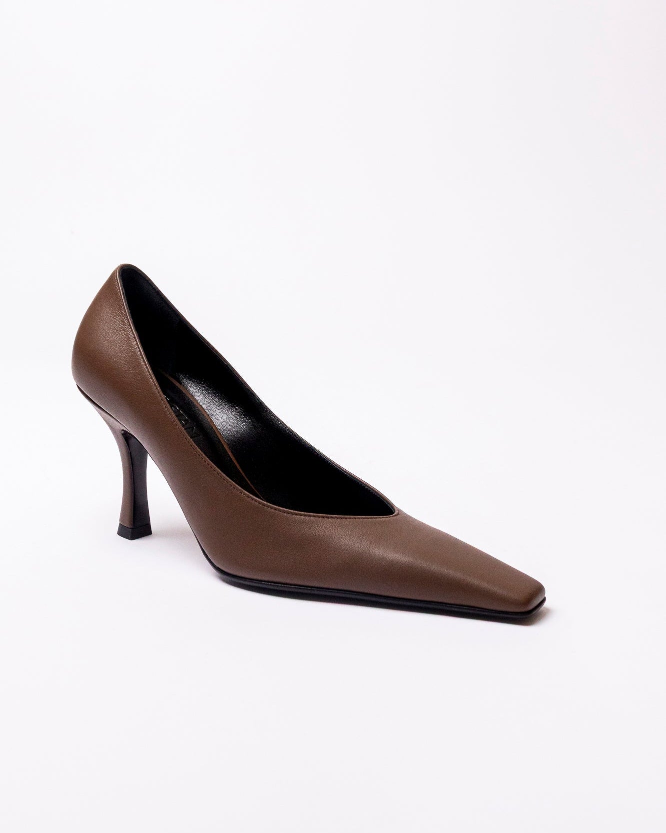 Brown high-heeled shoe on a white background