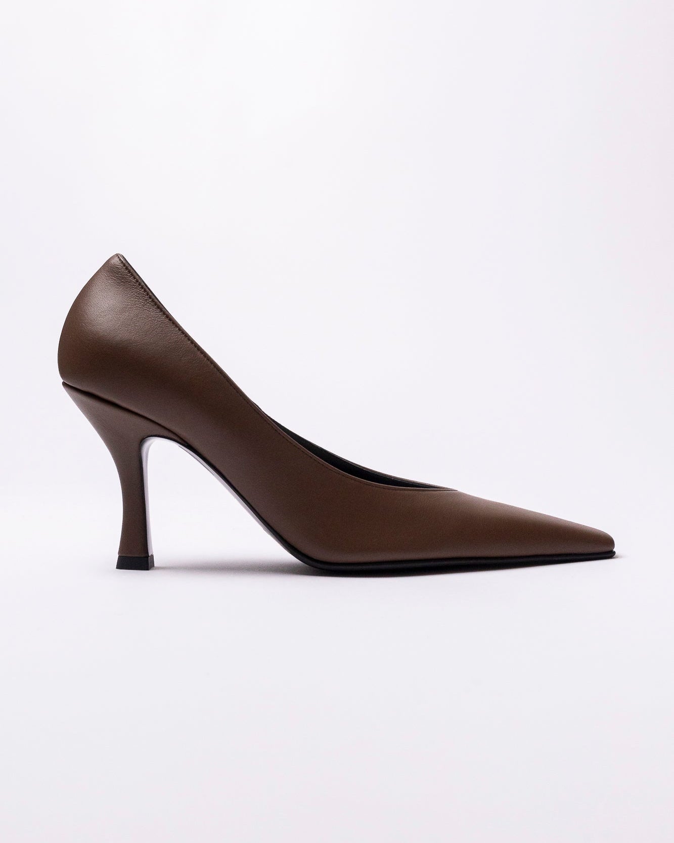 Brown high-heeled shoe on a white background