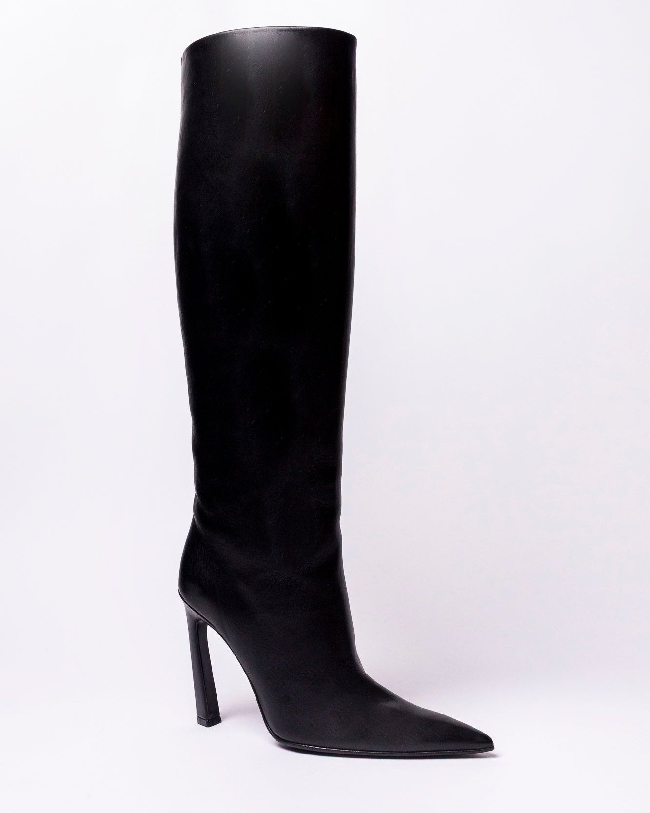 Black knee-high boot on a white background