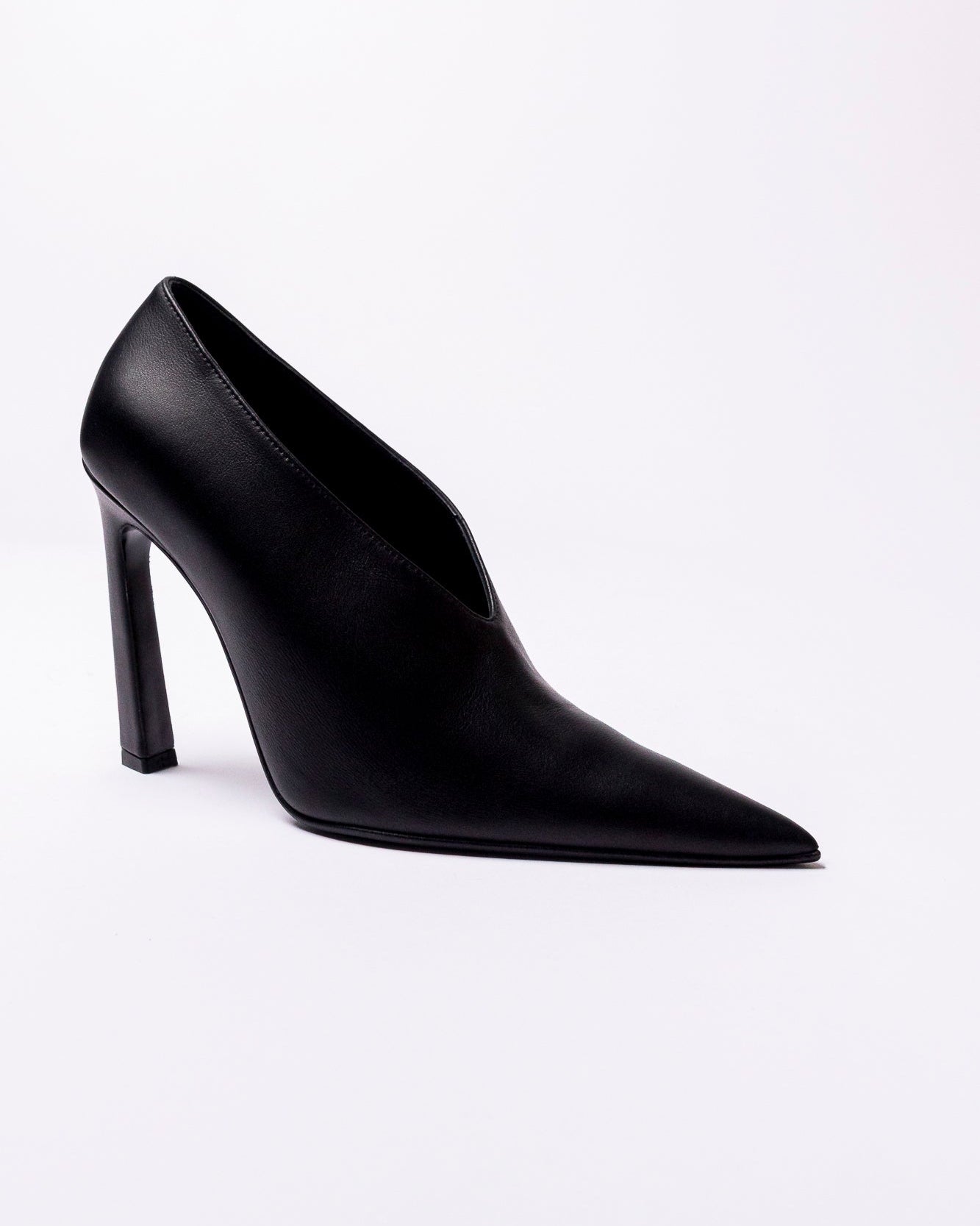 Black high-heeled shoe on a white background