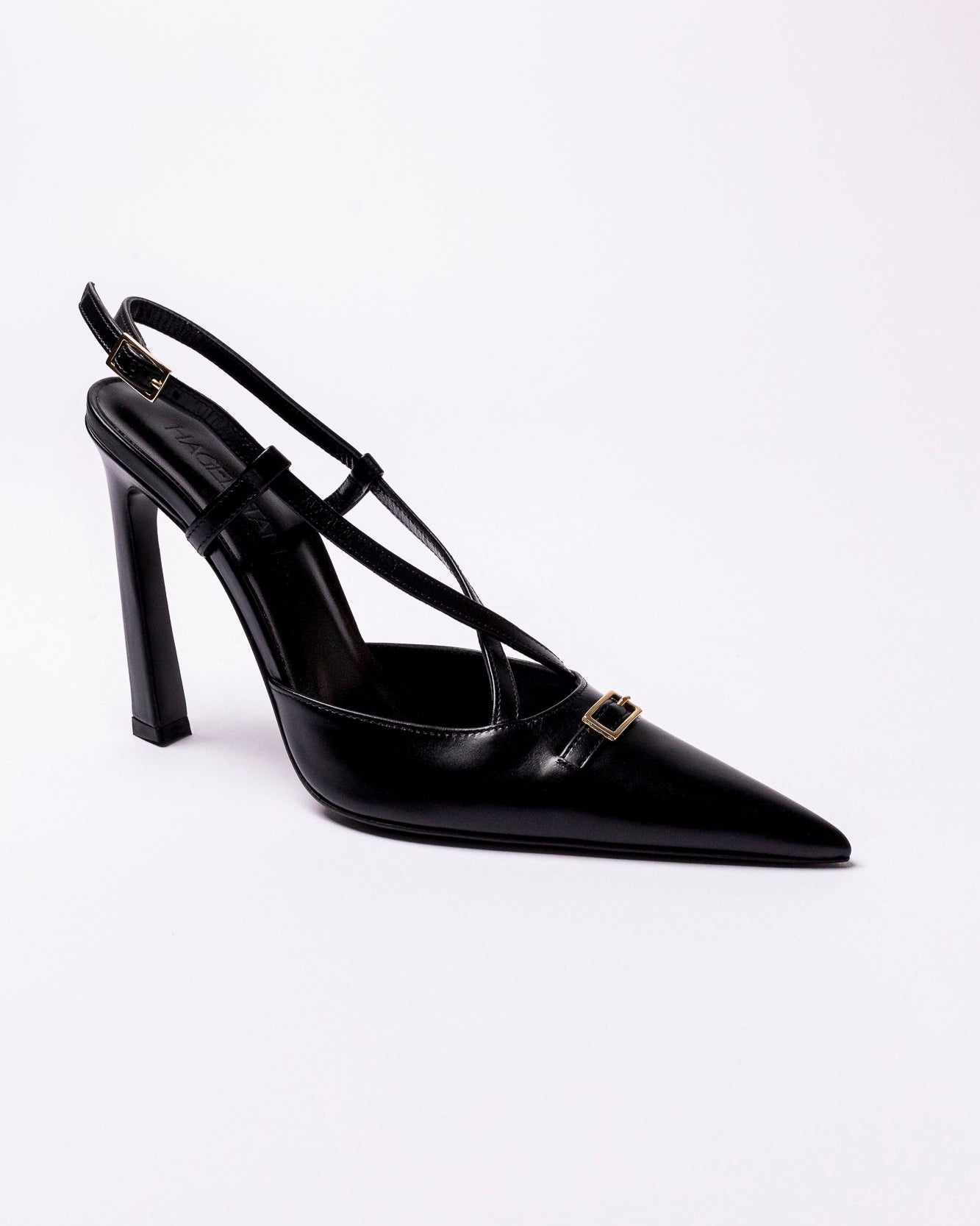 Black high-heeled shoe with a strap on a white background