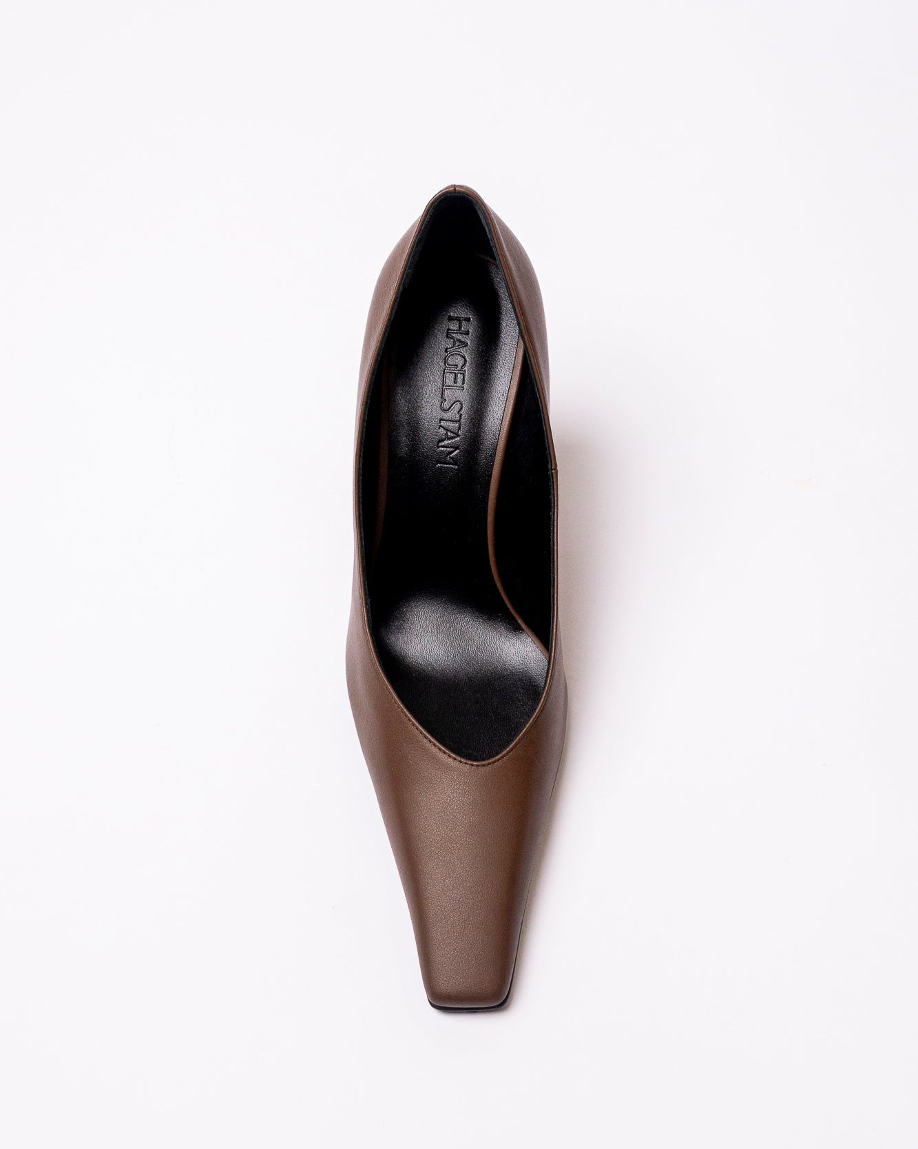 Brown high-heeled shoe on a white background