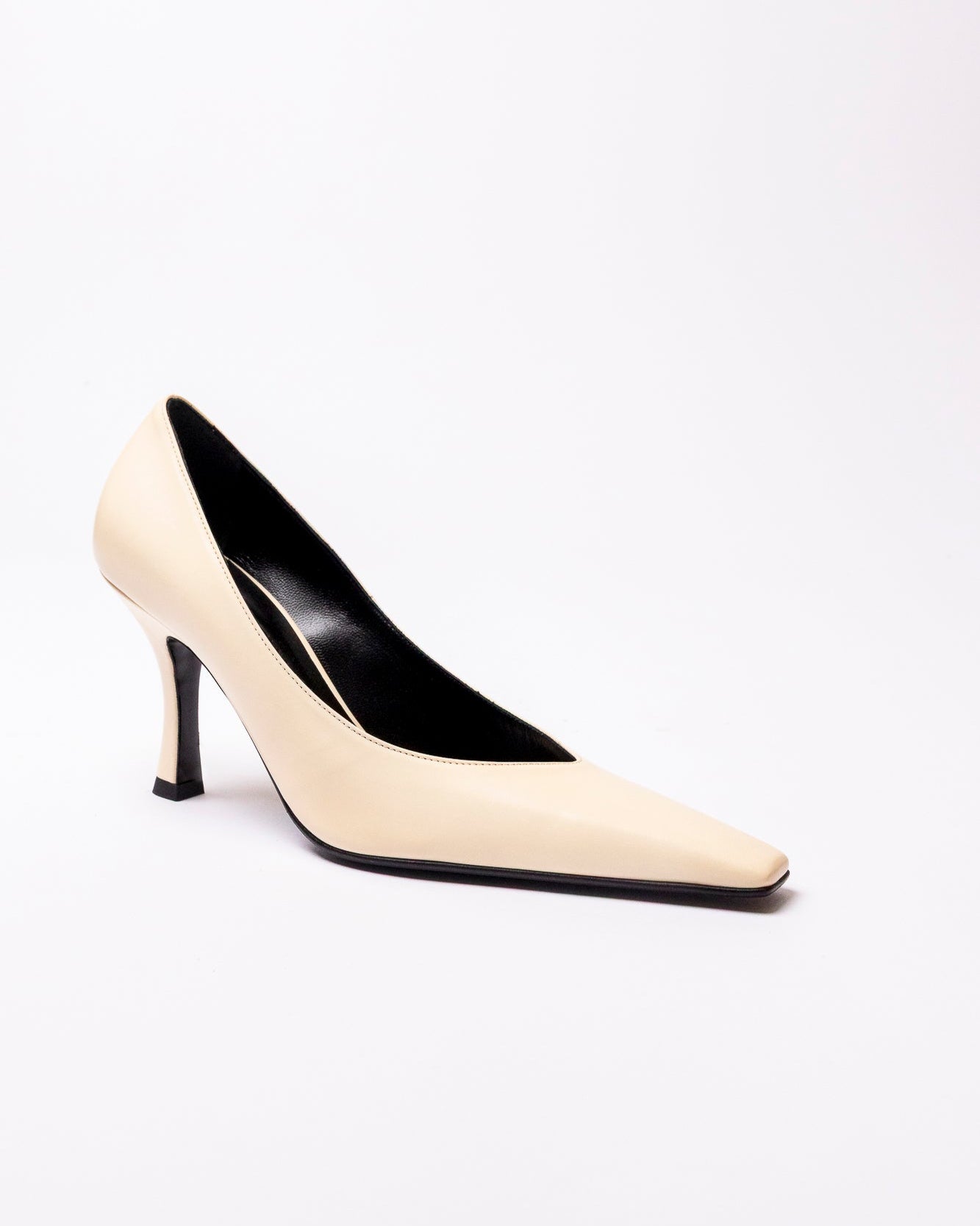 White high-heeled shoe on a white background